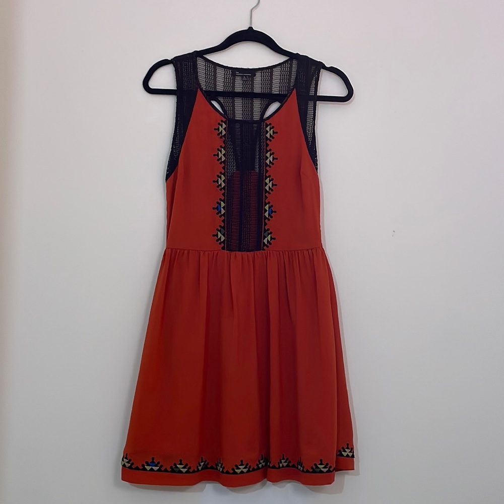 Brick red cocktail dress from the clothing company (Francesca’s boutique)